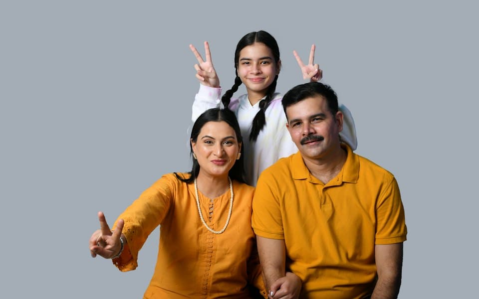 Happy Indian family smiling together